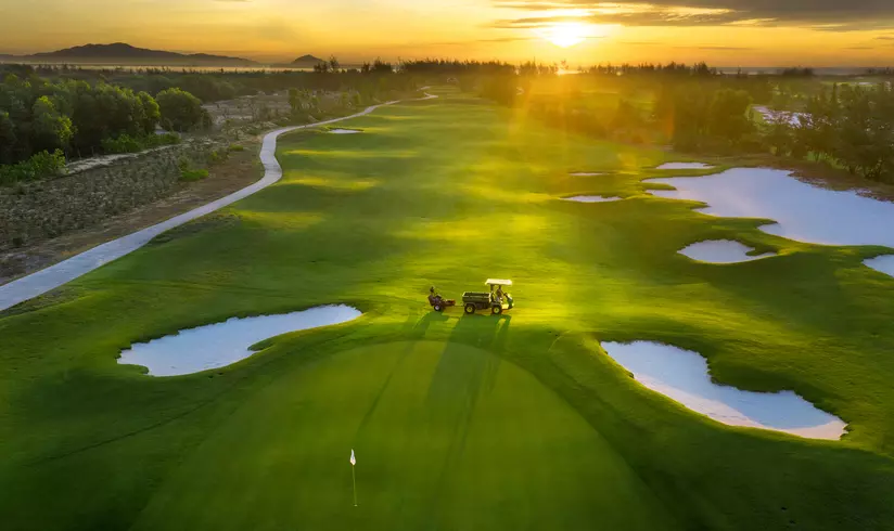Vinpearl Golf Nam Hoi An course at sunset